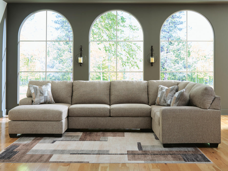 Newellen Sleeper Sectional with Chaise - Home Furniture And More (Brentwood, MD)