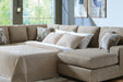 Newellen Sleeper Sectional with Chaise - Home Furniture And More (Brentwood, MD)