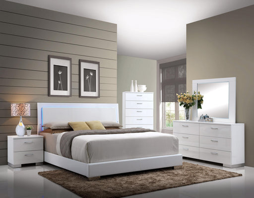 Lorimar White PU & Chrome Leg Eastern King Bed - Home Furniture And More (Brentwood, MD)