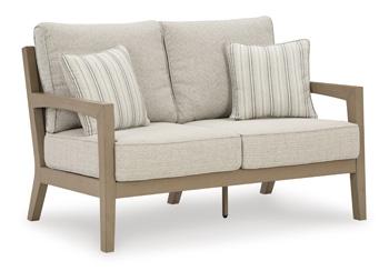 Hallow Creek Outdoor Loveseat with Cushion - Home Furniture And More (Brentwood, MD)