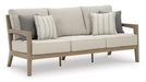 Hallow Creek Outdoor Sofa with Cushion - Home Furniture And More (Brentwood, MD)
