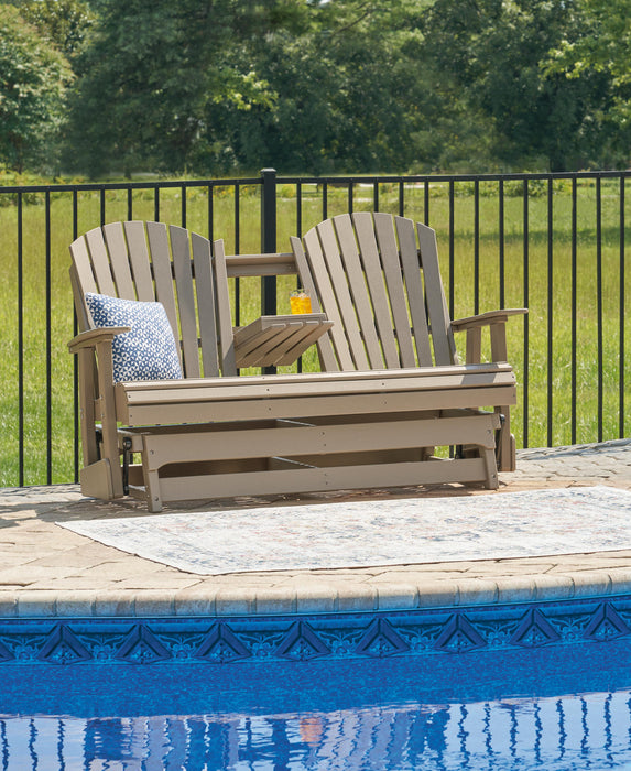 Hyland wave Outdoor Glider Loveseat - Home Furniture And More (Brentwood, MD)