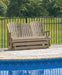Hyland wave Outdoor Glider Loveseat - Home Furniture And More (Brentwood, MD)