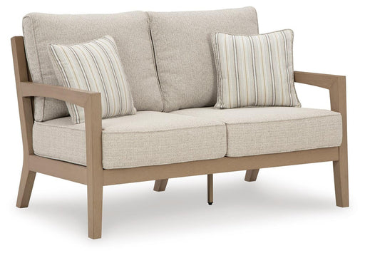 Hallow Creek Outdoor Loveseat with Cushion - Home Furniture And More (Brentwood, MD)