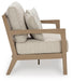 Hallow Creek Outdoor Loveseat with Cushion - Home Furniture And More (Brentwood, MD)