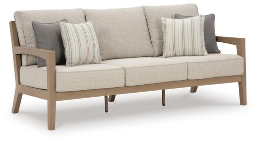 Hallow Creek Outdoor Sofa with Cushion - Home Furniture And More (Brentwood, MD)