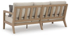 Hallow Creek Outdoor Sofa with Cushion - Home Furniture And More (Brentwood, MD)