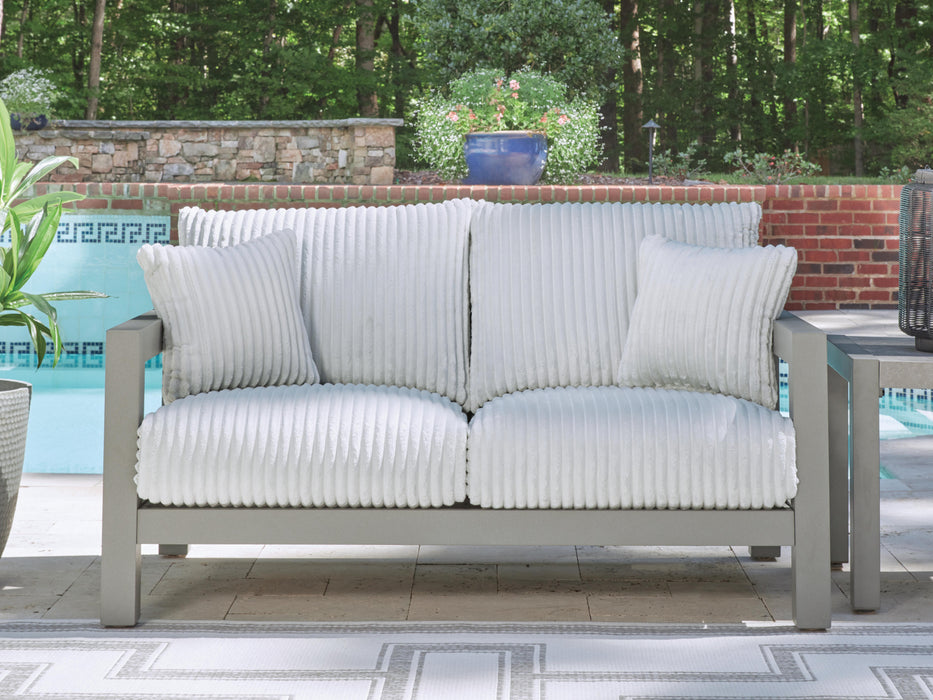 Hurley Park Outdoor Loveseat with Cushion - Home Furniture And More (Brentwood, MD)