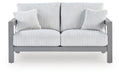 Hurley Park Outdoor Loveseat with Cushion - Home Furniture And More (Brentwood, MD)