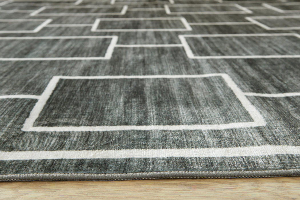 Elderland Washable 7'6" x 9'6" Area Rug - Home Furniture And More (Brentwood, MD)