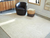 Wolbert 7'8" x 10' Area Rug - Home Furniture And More (Brentwood, MD)
