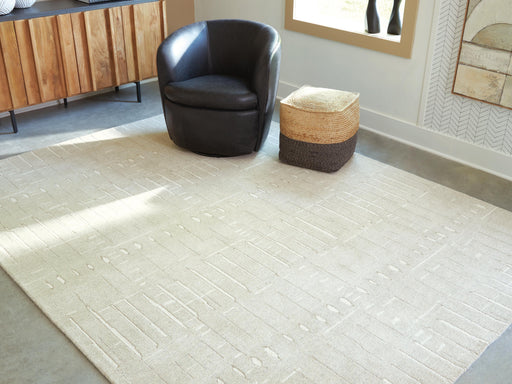 Wolbert 7'8" x 10' Area Rug - Home Furniture And More (Brentwood, MD)