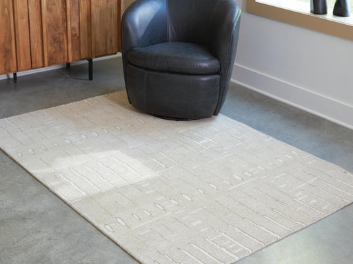 Wolbert 5' x 7' Area Rug - Home Furniture And More (Brentwood, MD)