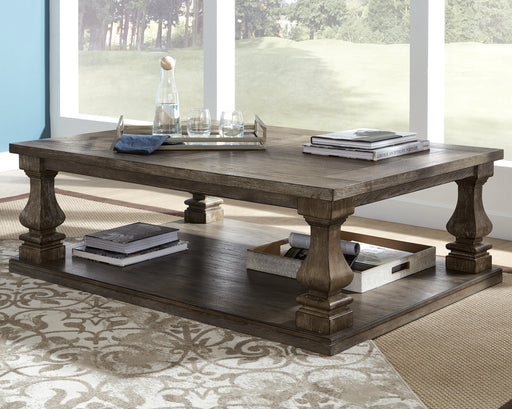 Johnelle Coffee Table - Home Furniture And More (Brentwood, MD)