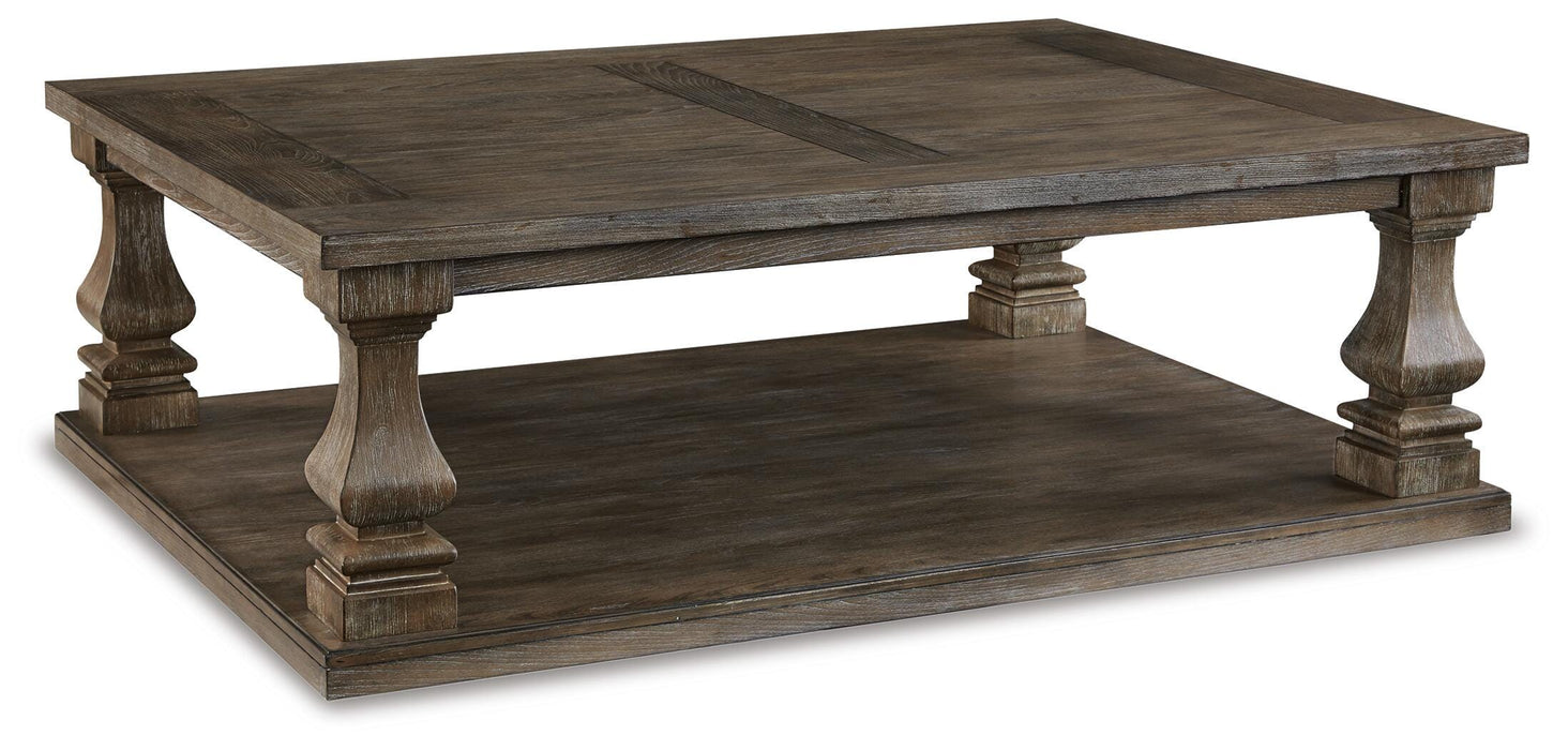 Johnelle Coffee Table - Home Furniture And More (Brentwood, MD)
