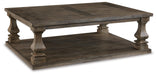 Johnelle Coffee Table - Home Furniture And More (Brentwood, MD)